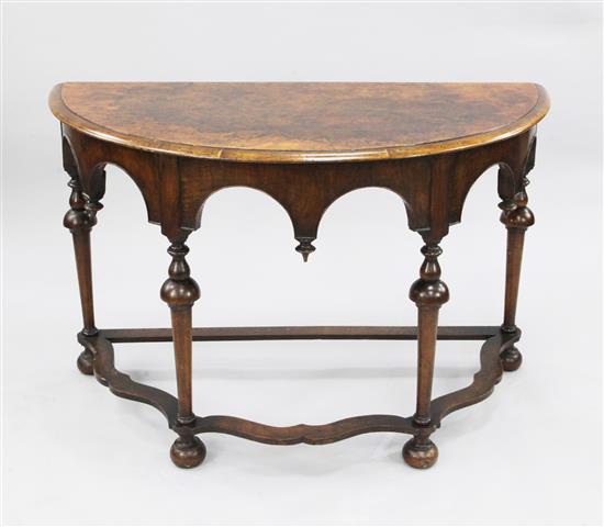 A 17th century style walnut demi lune table, W.3ft 10in.